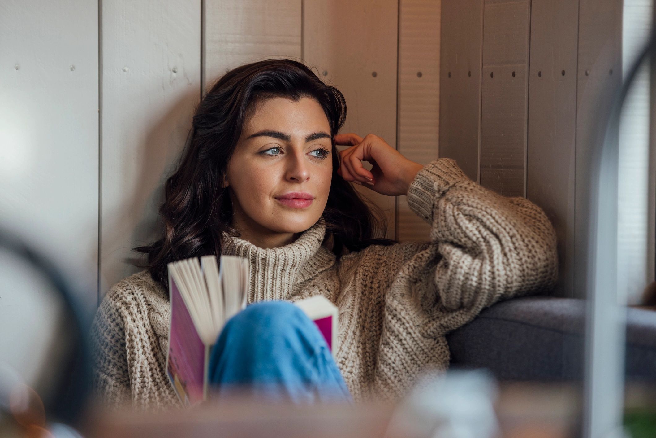 Woman reading quietly in a peaceful setting