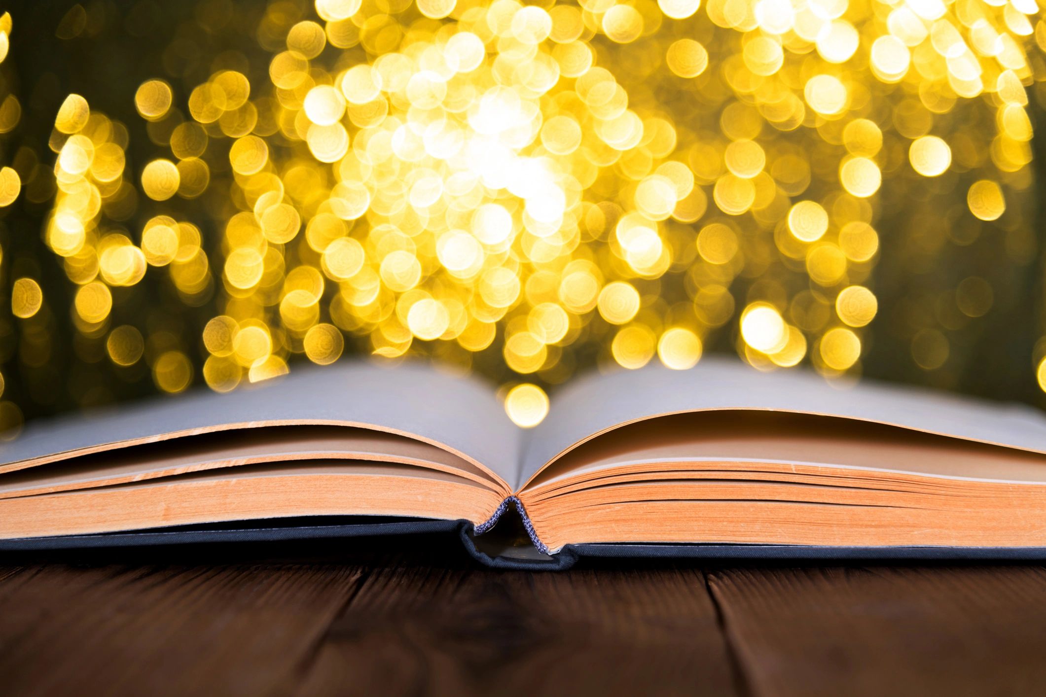 Open book with light symbolizing Scripture and encouragement